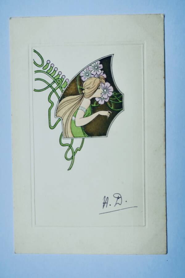 Art Nouveau young woman motif in gold and embossed design