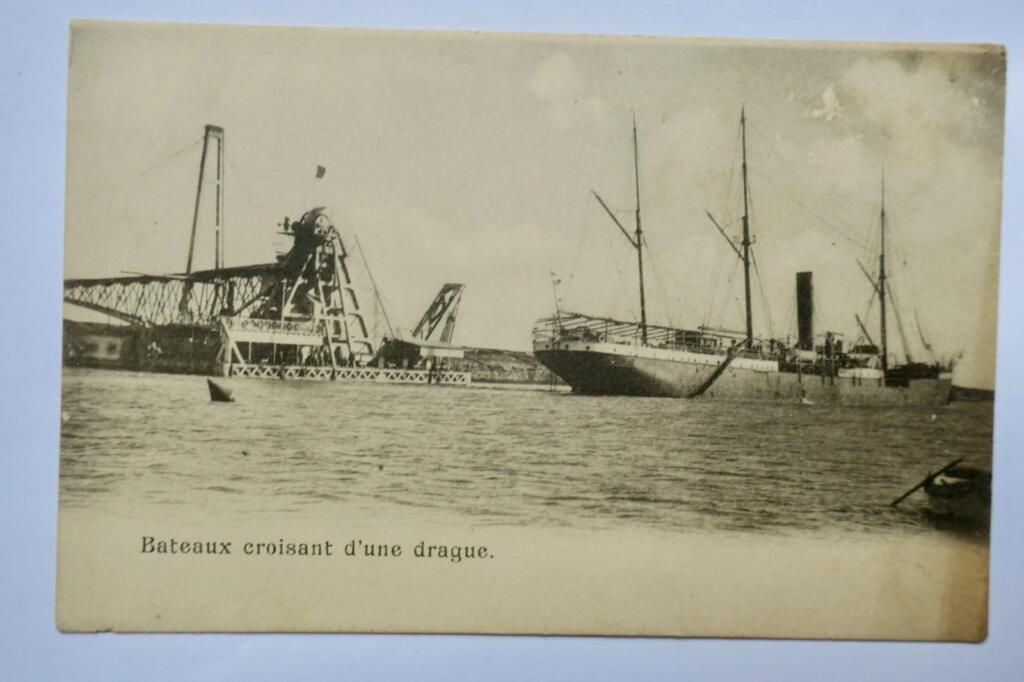 Vessels Passing a Dredger