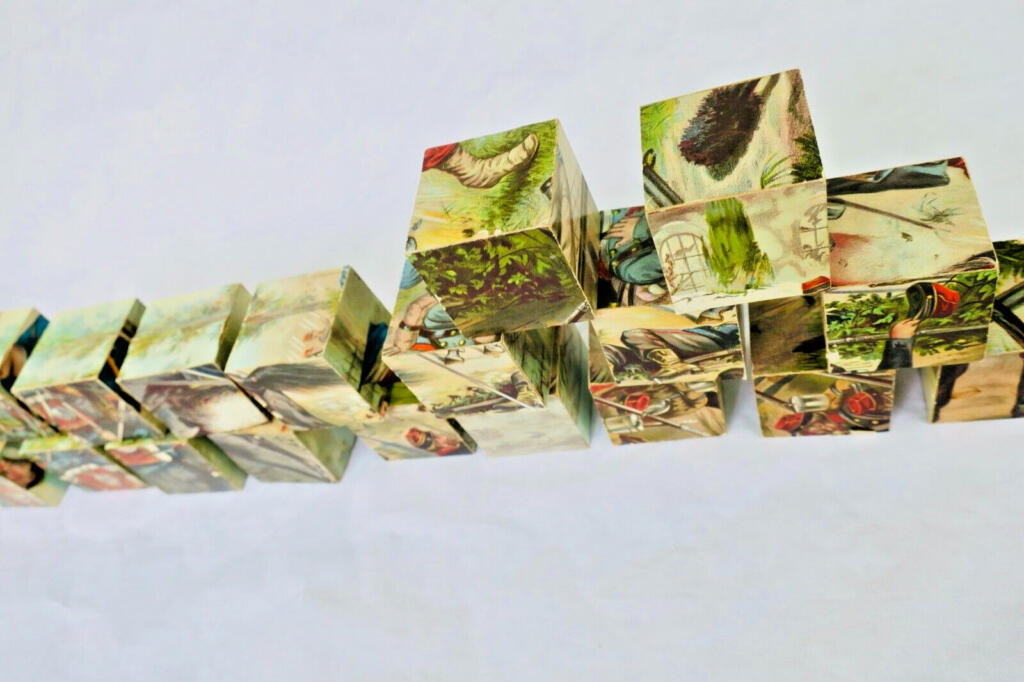 19th-century military cube puzzle set with chromolithographs